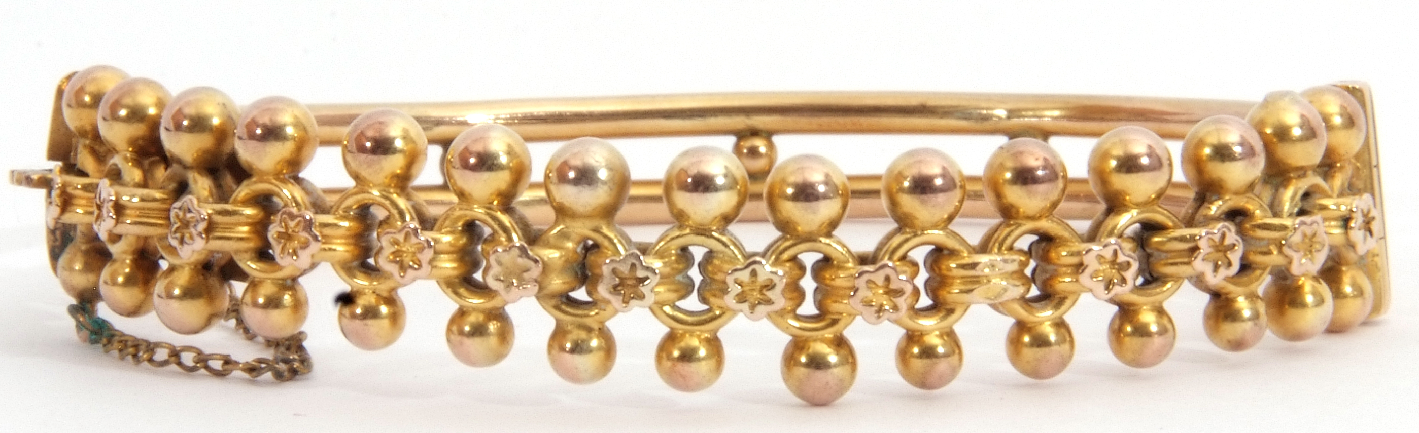Antique Etruscan style hinged bracelet, a pierced circular and bead design to a tubular double