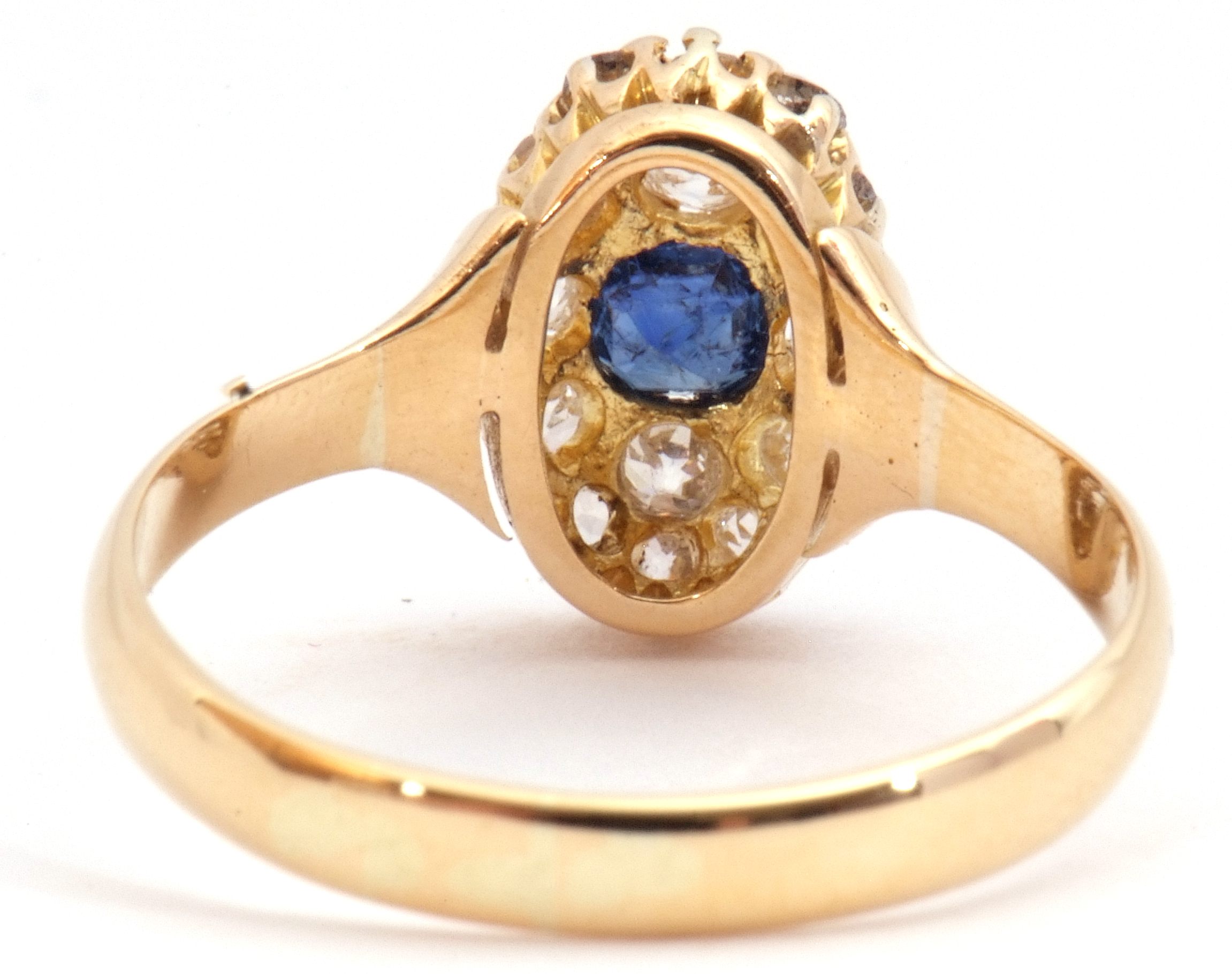 Sapphire and diamond cluster ring, the oval shaped design centring a round cut sapphire and 14 small - Image 4 of 8