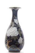 Pate sur pate vase by Frederick Rhead for Wood & Sons, the vase with a tube lined floral design,