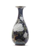 Pate sur pate vase by Frederick Rhead for Wood & Sons, the vase with a tube lined floral design,