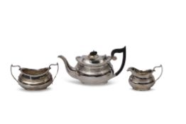 George V three piece tea set of compressed oval form with raised body bands, gadrooned rims,