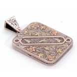 Antique precious metal large rectangular shaped locket, the front engraved and chased in a foliate