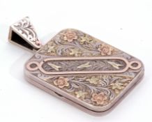 Antique precious metal large rectangular shaped locket, the front engraved and chased in a foliate