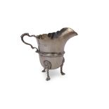 Edward VII large cream jug of helmet shape, having card cut rim, leaf capped scrolled handle and