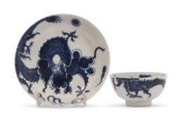 Lowestoft porcelain tea bowl and saucer decorated in underglaze blue with the dragon pattern, the