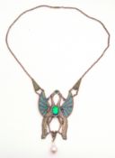 Large Art Nouveau style enamel pendant, a design with two facing peacocks with central iridescent