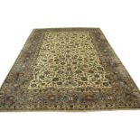 Good quality modern Keshan large carpet, multi-gull border, central panel of flowering foliage,