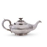 William IV tea pot of compressed circular form with raised reeded body band, hollow looped handle,