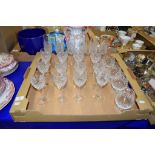 BOX OF CUT GLASS WINE GLASSES AND FLUTES