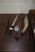 SELECTION OF KNIVES INCLUDING A KUKRI WITH WOODEN HANDLE AND A MILITARY TYPE KNIFE IN GREEN SHEATH