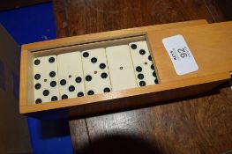 SET OF DOMINOES IN WOODEN BOX