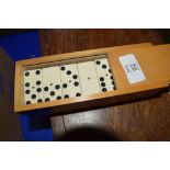 SET OF DOMINOES IN WOODEN BOX