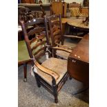 TWO 19TH CENTURY LANCASHIRE STYLE LADDERBACK CARVER CHAIRS WITH RUSH SEATS
