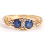 Early 20th century 18ct gold sapphire and diamond ring, featuring two old faceted sapphires,