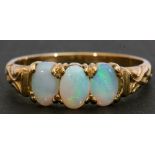 9ct gold and opalescent three-stone ring, featuring three oval cabochon opalescents, individually