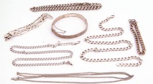 Mixed Lot: silver curb link part watch chain, a long filed curb link chain stamped 925, a 925 curb