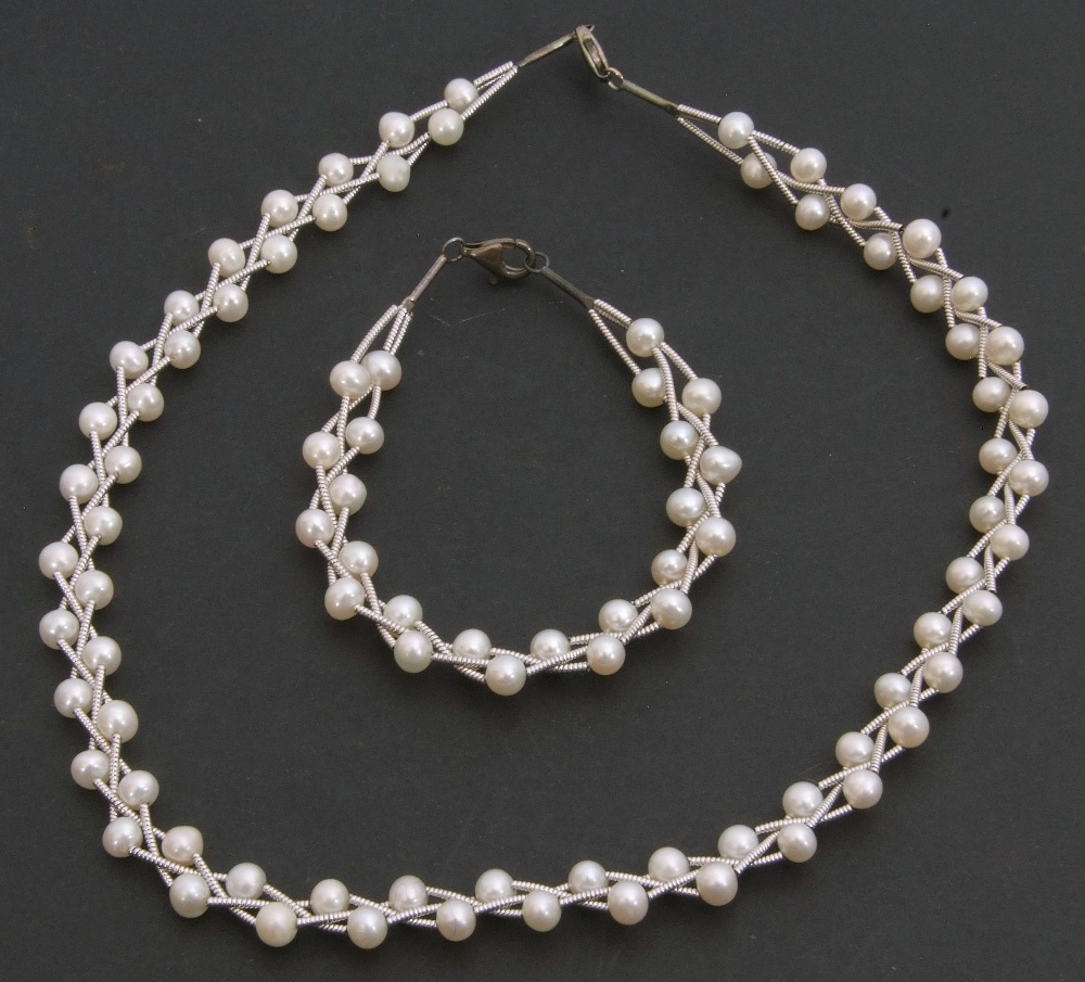 Mixed Lot: white metal and cultured pearl necklace and matching bracelet, both stamped 925, 42cm