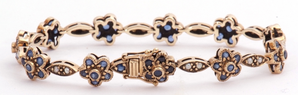 9ct gold sapphire and seed pearl bracelet featuring 21 links alternating with 11 sapphire clusters - Image 2 of 3