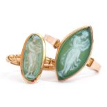 Two glass cameo rings, a green and white glass cameo depicting a lady holding a baby, each in a