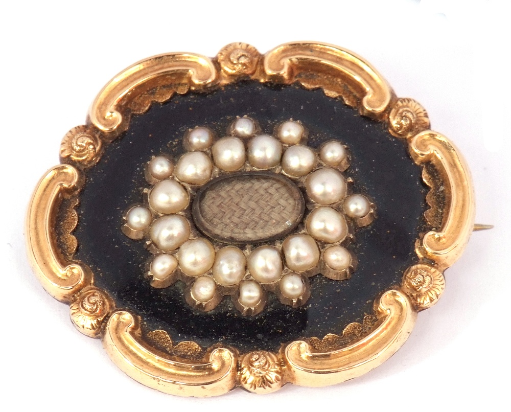 Early Victorian gold, black enamel and seed pearl mourning brooch, the centre with a glazed panel of - Image 3 of 5