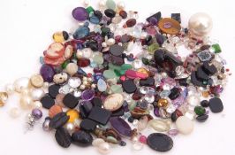 Quantity of loose stones and beads to include amethyst, opal, topaz and cubic zirconia etc
