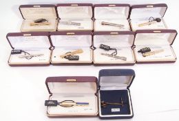 Mixed Lot: nine cased tie-clips, one silver example, eight plated examples, some set with lapis,