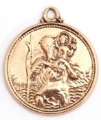 9ct gold St Christopher pendant, the verso engraved with a monogram, Birmingham 1962, 20mm diam, 3.