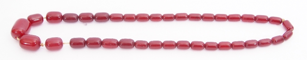 Vintage cherry red amber bead necklace, a single row of graduated oblong beads, 1cm - 2.5cm diam, - Image 2 of 2