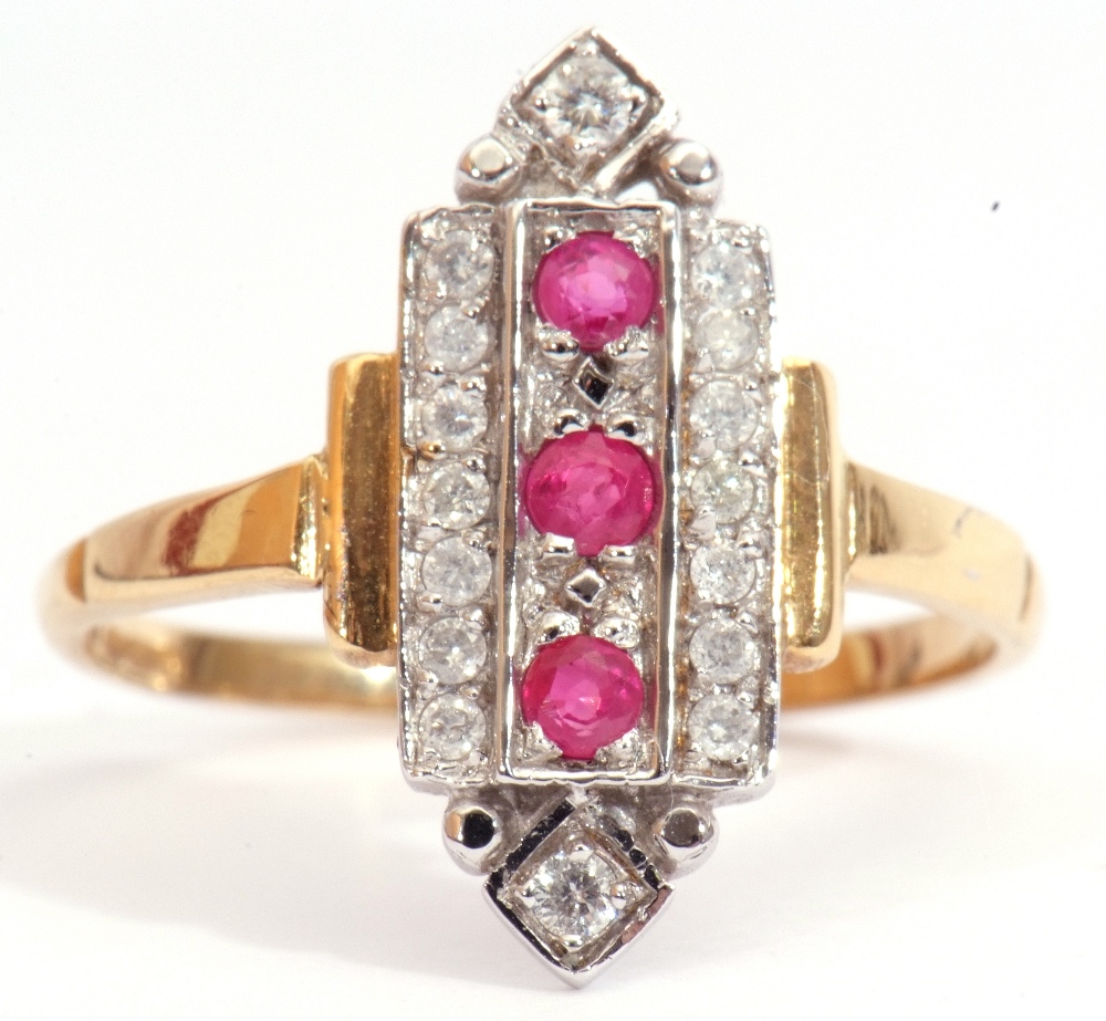 Modern Art Deco style ruby and diamond cluster ring, featuring three round cut rubies surrounded