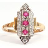 Modern Art Deco style ruby and diamond cluster ring, featuring three round cut rubies surrounded