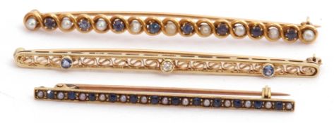 Mixed Lot: 14K stamped sapphire and diamond brooch, the elongated pierced bar featuring bezel set