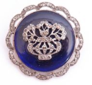 Victorian diamond and blue enamel brooch, the circular blue enamel panel applied with a diamond