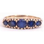 Vintage 9ct gold five stone sapphire ring, featuring five round cut faceted graduated sapphires,