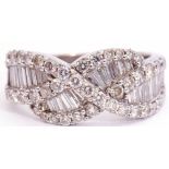 Precious metal diamond cluster ring, a design featuring pave set baguette diamonds, overlapping