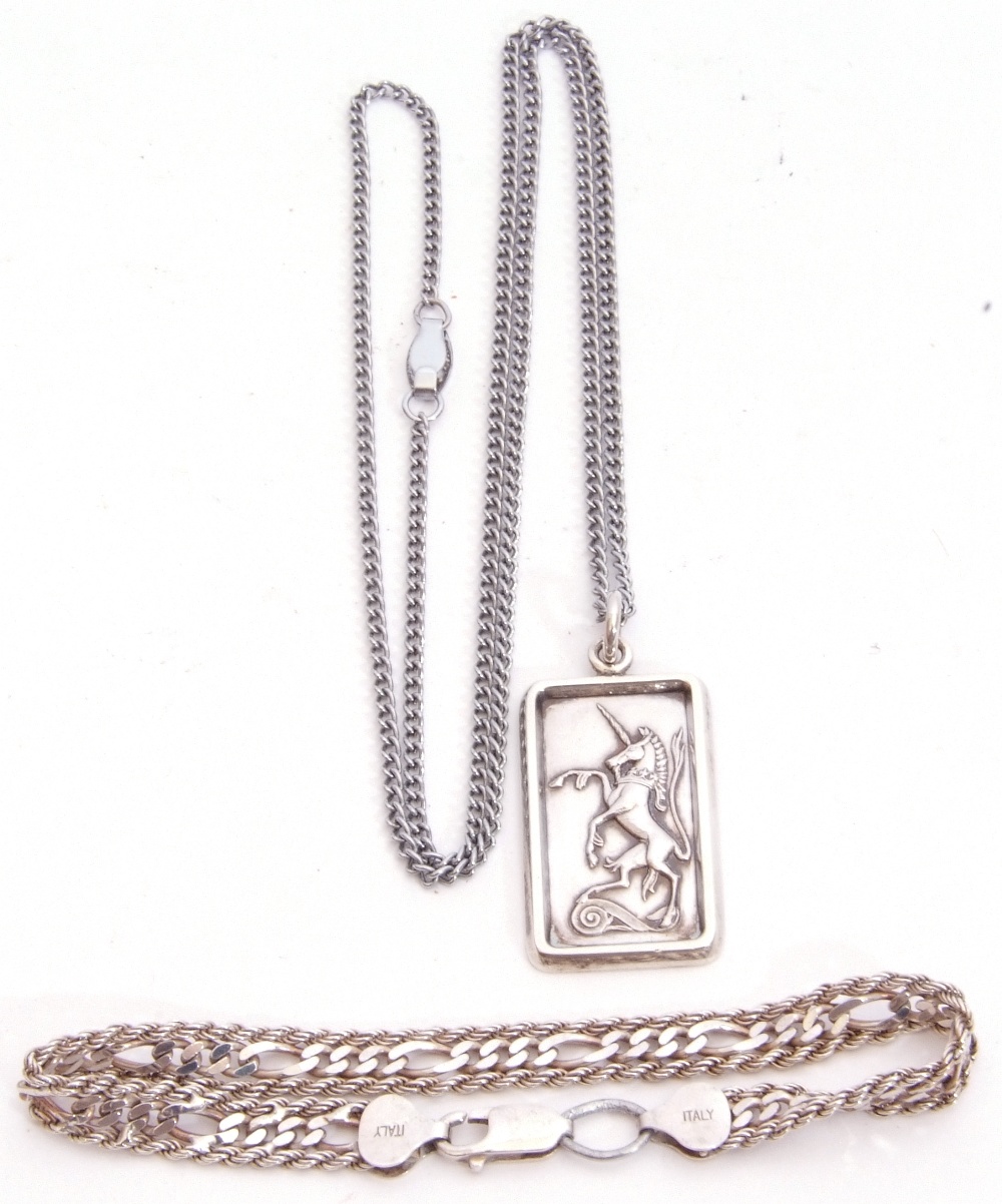 Mixed Lot: hallmarked silver unicorn pendant suspended from a metal chain, an Italian 925 stamped