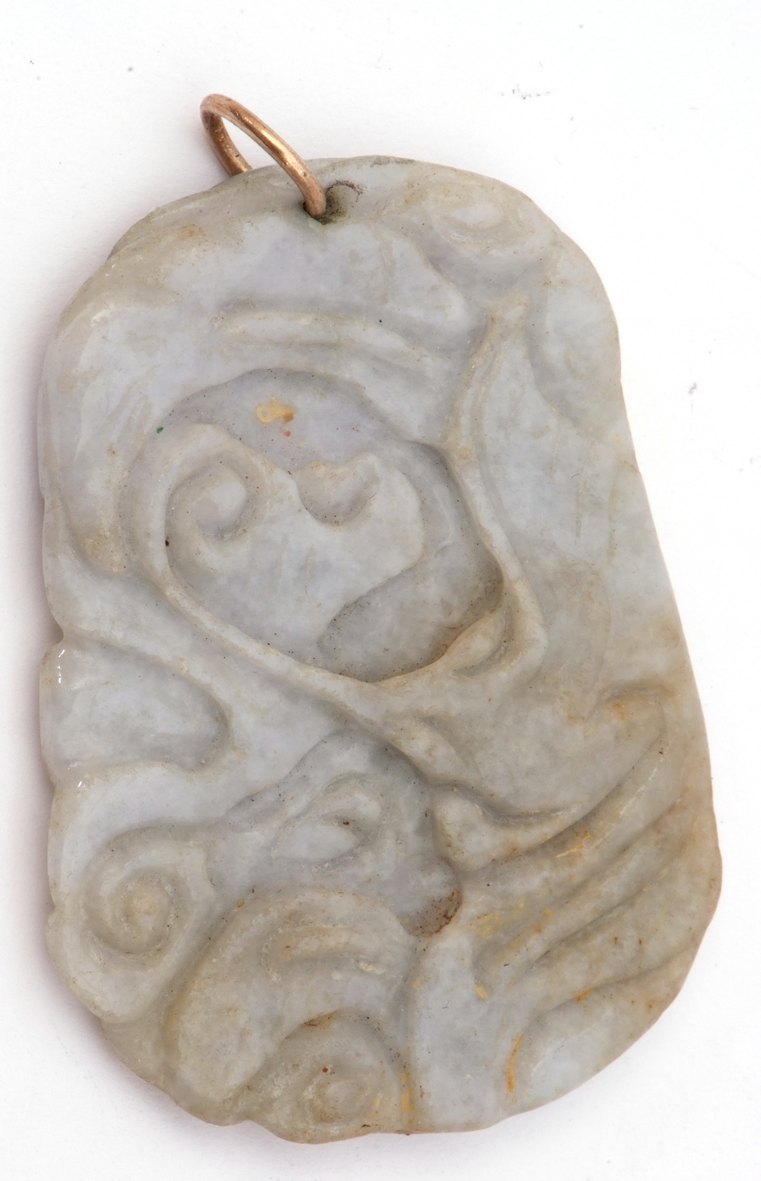 Antique carved jade pendant of shaped rectangular flat form, deep carved with a naturalistic detail, - Image 2 of 3