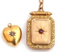 Victorian 9ct gold and garnet set locket of rectangular form, the centre with a small garnet in a