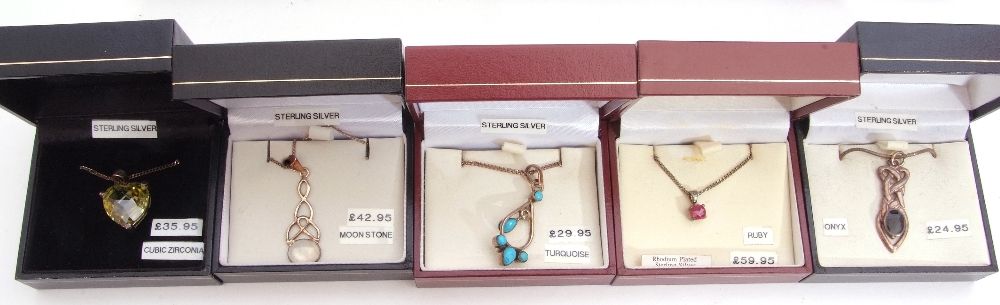 Mixed Lot: ten white metal pendants/necklaces to include turquoise, ruby, and cubic zirconia - Image 3 of 3