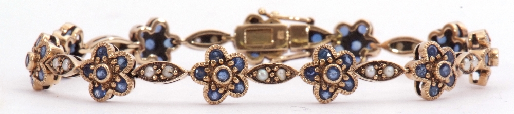 9ct gold sapphire and seed pearl bracelet featuring 21 links alternating with 11 sapphire clusters - Image 3 of 3