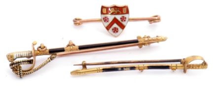 Mixed Lot: 9ct stamped sword brooch decorated with white and black enamel detail, 6cm long, 9ct gold