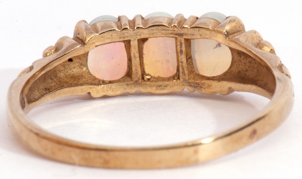 9ct gold and opalescent three-stone ring, featuring three oval cabochon opalescents, individually - Image 6 of 7