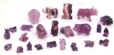 Quantity of purple quartz carved animals, to include frogs, dogs, elephants, tortoises etc, together