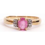 18ct gold pink tourmaline and diamond ring, the oval faceted shaped tourmaline four claw set and