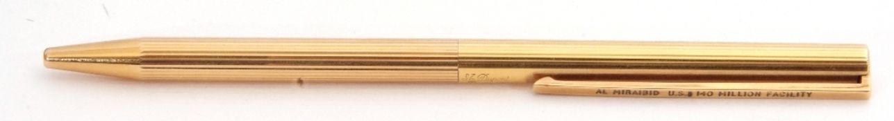 Vintage S T Dupont Paris gold plated pen, a revolving mechanism with textured engine turned link