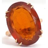 Vintage cognac coloured citrine dress ring, an oval faceted citrine, double claw set in a basket