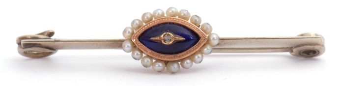 Antique and precious metal pin brooch, the knife edge bar centring a navette shaped blue enamel