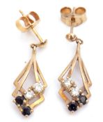 Pair of 9ct gold paste set drop earrings of open work design, decorated with two blue and two