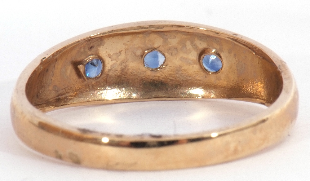 9ct gold sapphire three stone ring, the plain polished design featuring 3 round cut sapphires, - Image 4 of 7