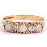 18ct gold opal and diamond five stone ring, alternate set with three round cabochon opals and two