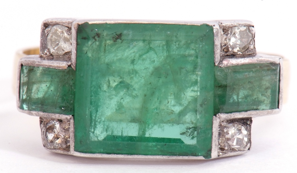 Vintage emerald and diamond set ring, the square emerald 8mm x 8mm between small rectangular cut